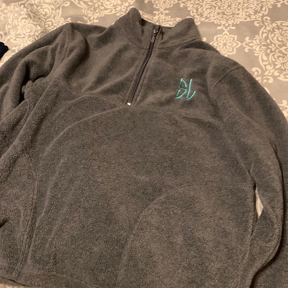 Monograms “SL” initialed fleece pullover